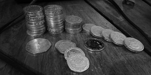 Stacks of coins - pounds, 50p, 20p and 10p.